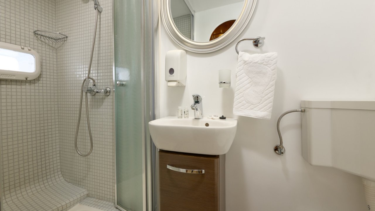 white bathroom on board a yacht