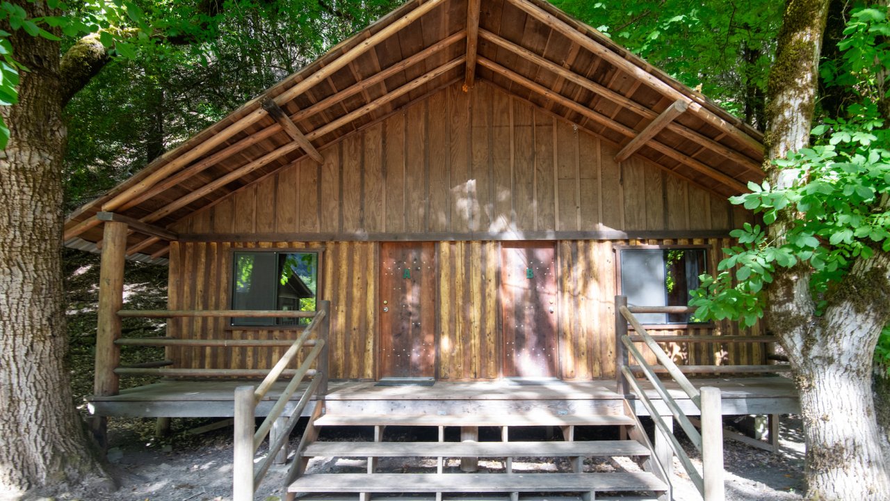 Duplex cabins labeled A and B at Black Bar Lodge along the Rogue River