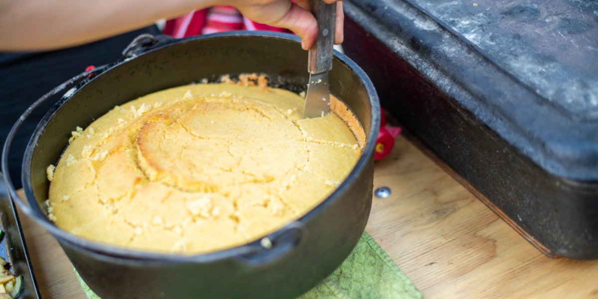 dutch oven corn bread being sliced