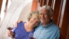 older couple on deck of yacht
