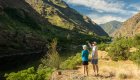 people overlooking hells canyon in idaho