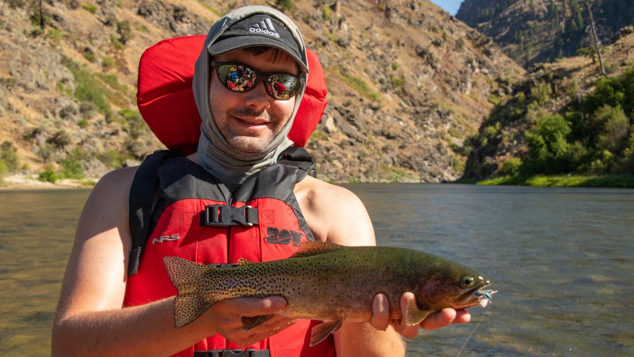 Person holding a trout caught on the Middle Fork Salmon River