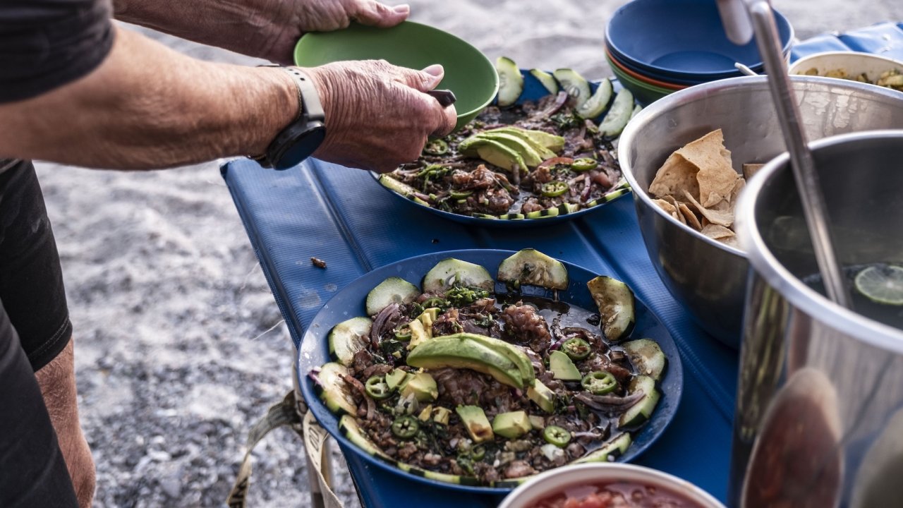 Fresh Mexican cuisine served beachside on a Loreto Baja sea kayak tour, highlighting the cultural and culinary experiences of kayaking in Mexico.