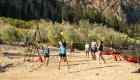 People playing beach volleyball along the Main Salmon River