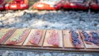 Fresh salmon fillets prepared on cedar planks for cooking during a wilderness rafting trip on the Middle Fork of the Salmon River in Idaho.