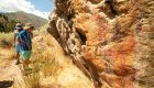 Hikers exploring ancient petroglyphs along the Middle Fork Salmon River in Idaho