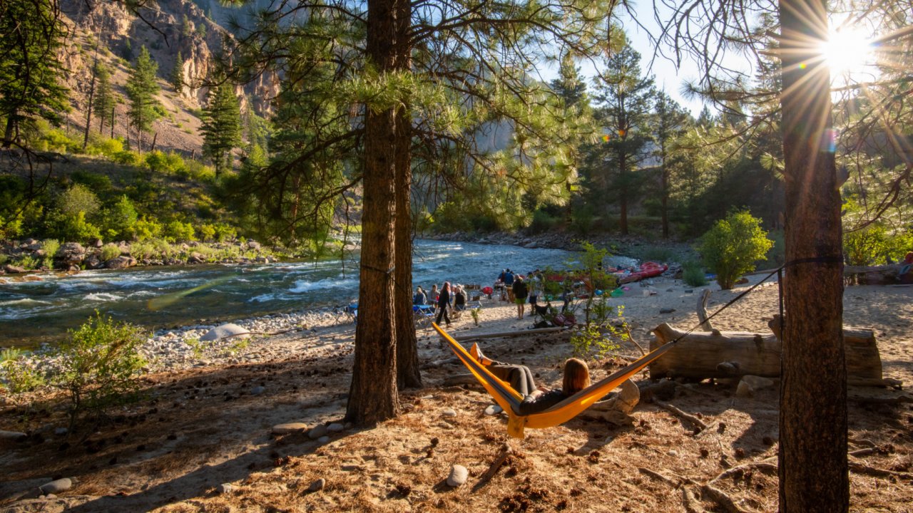 hammock hung in trees at rafting camp along the salmon river in idaho