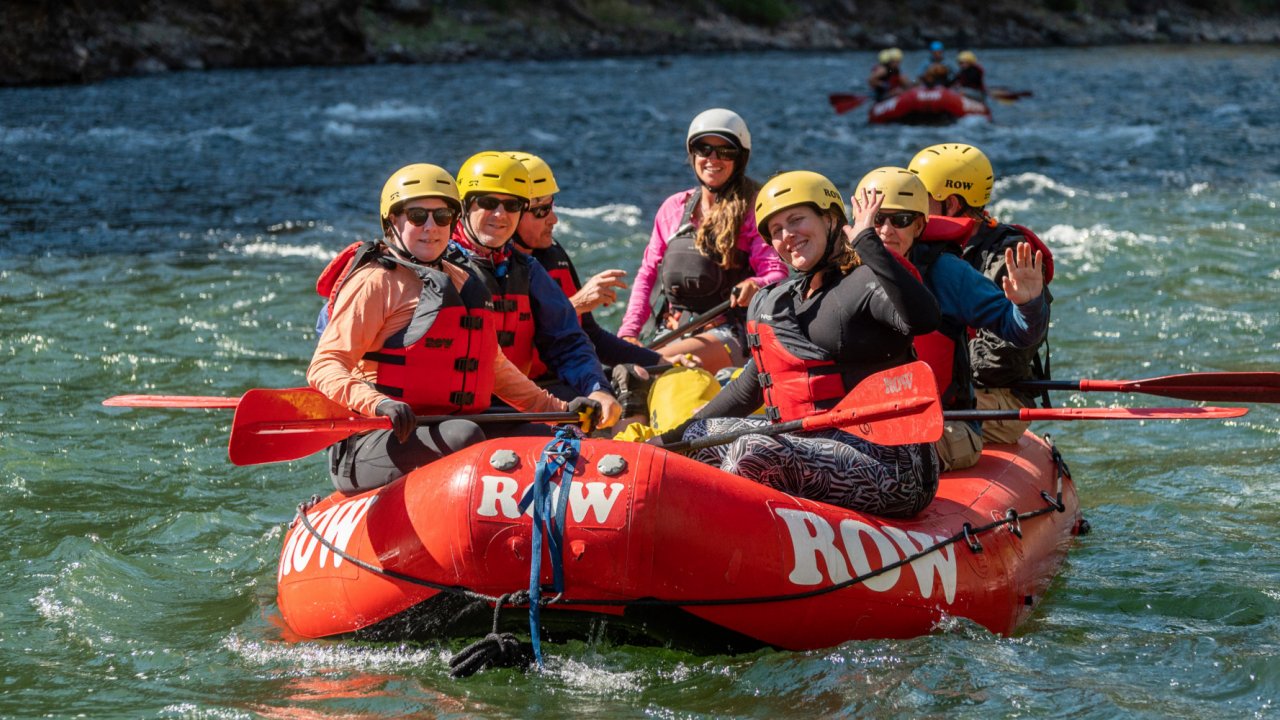 ROW rafting group enjoying a gentle stretch of river! whitewater rafting group