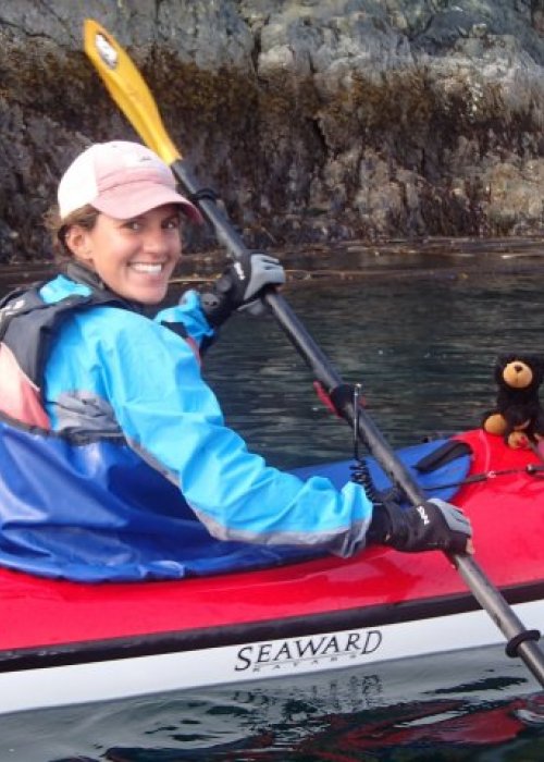 female sea kayak guide