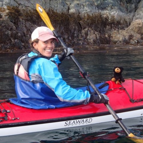 female sea kayak guide