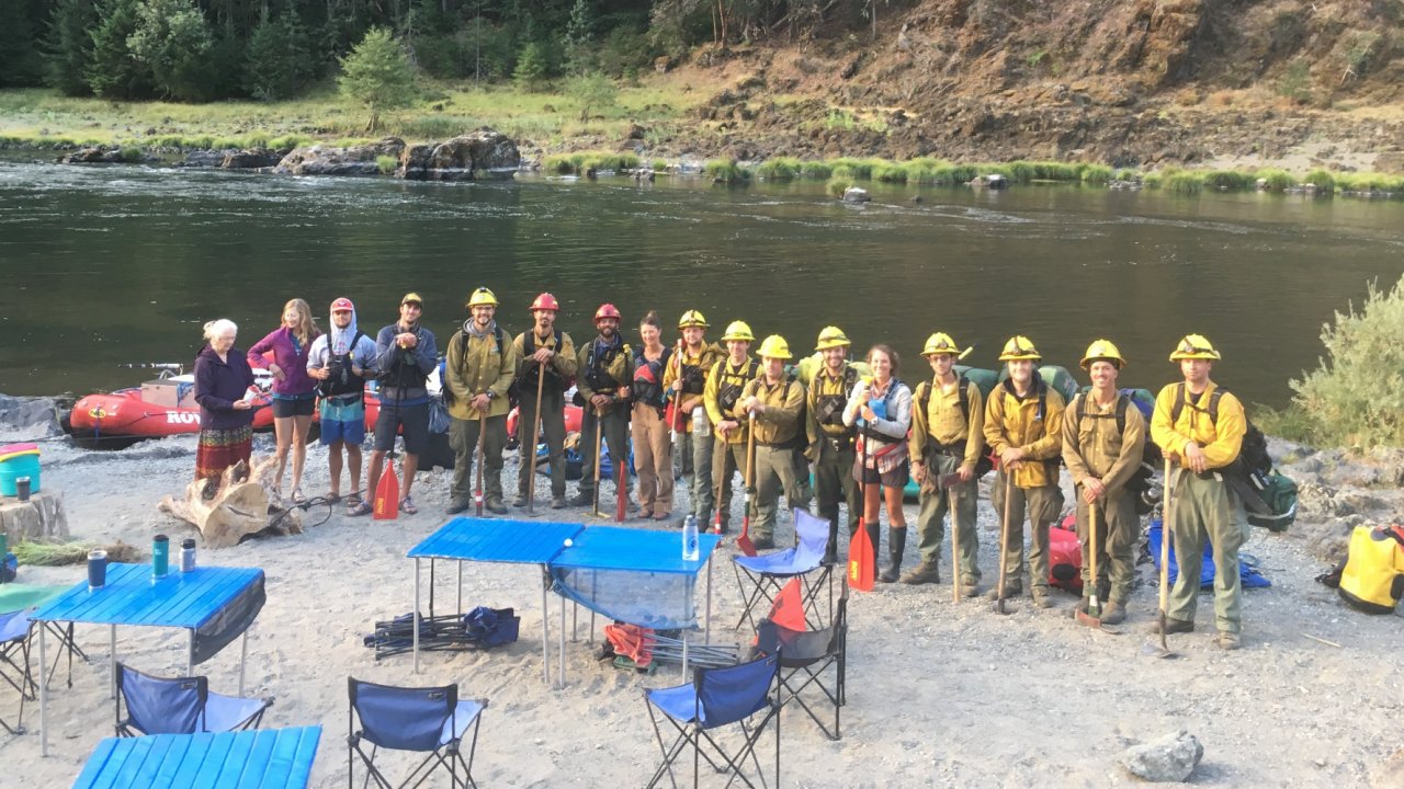 Our Rogue River crew shares a beach with a group of wildland fire fighters in Oregon. firefighters oregon