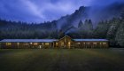 Half Moon Bar Lodge along the Rogue River at dusk
