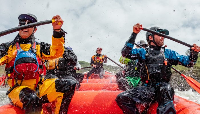 whitewater rafters in dry suits