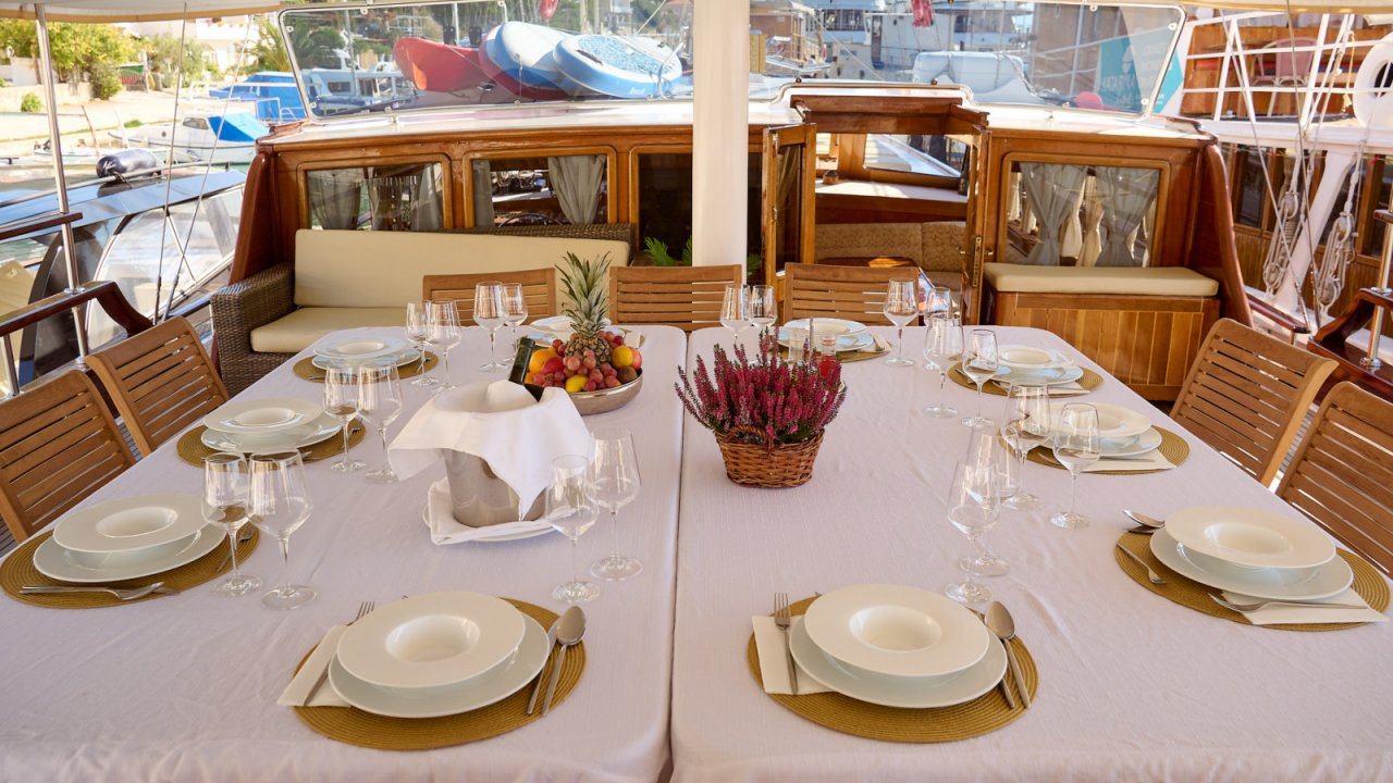 table on deck of sailing gulet in croatia