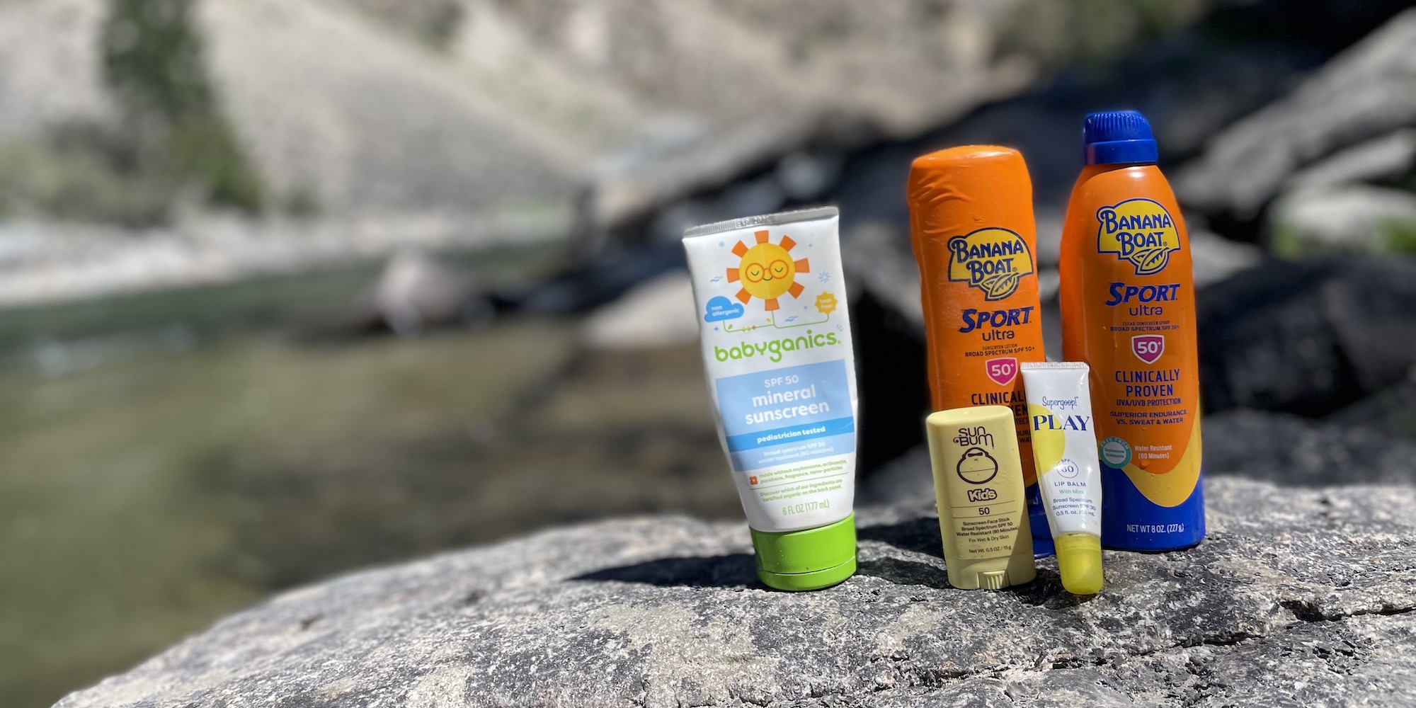 A variety of sunscreen on a rock along the Salmon River