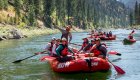 Group floating on calm waters during a salmon river white water rafting Idaho adventure.